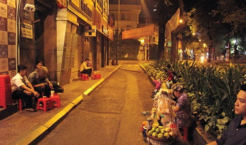 around the clock cafes offer glimpses of saigon by night