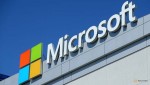 microsoft reports loss due to tax charge