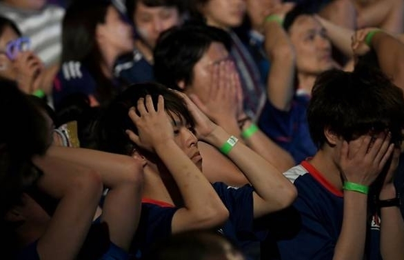 stunned silence in tokyo as japan dream ends