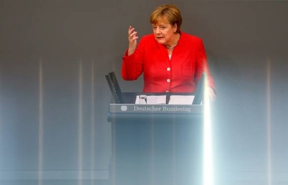 Merkel warns Trump against trade war