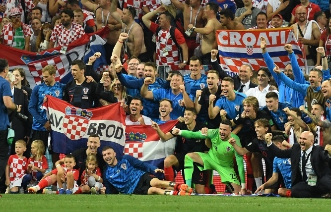 World Cup: Croatia reach first final as England pain goes on