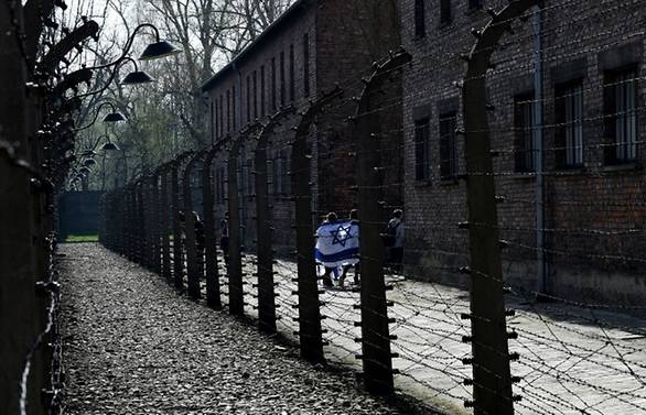 Tourists charged with stealing bricks from Auschwitz memorial