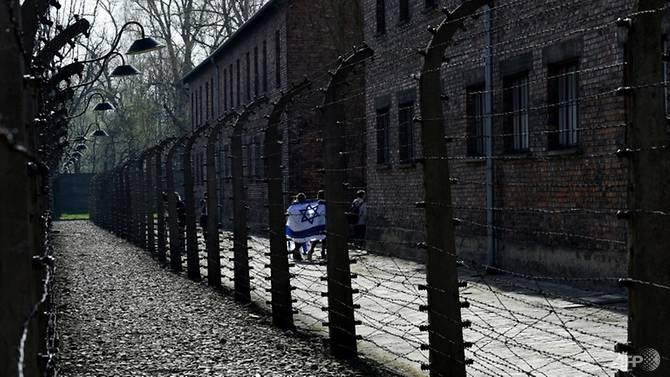 tourists charged with stealing bricks from auschwitz memorial