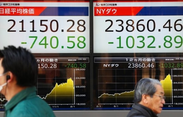 Asian markets mostly down as data shows China growth slowing