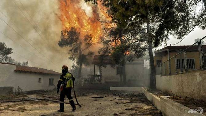 at least five dead in greek wildfires