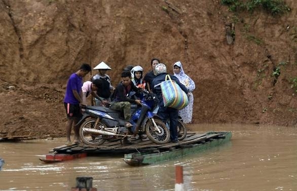 rains hamper search for survivors after laos dam collapse