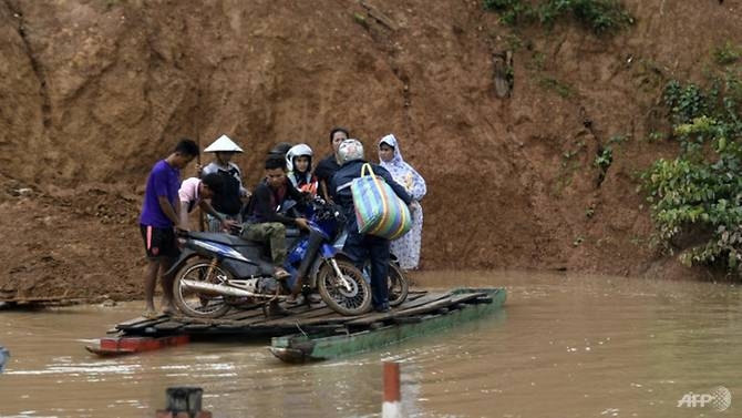rains hamper search for survivors after laos dam collapse