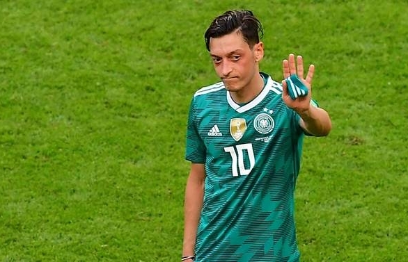 German FA boss rejects Ozil racism charge, but admits mistake