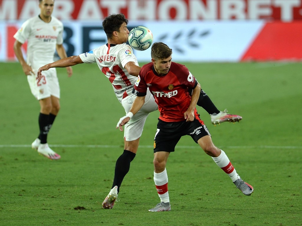 sevilla on the cusp of champions league qualification after mallorca win