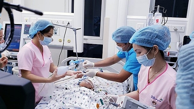 conjoined twins in stable condition after separating operation