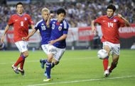 japan downplay win over s korea