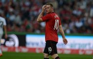 Manchester United striker Wayne Rooney, pictured August 11, has warned Premier League defenders that he plans to keep terrorising them for the next decade. (AFP Photo/Patrik Stollarz)