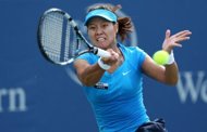 Li Na of China hits a forehand at the Western & Southern Open on August 19, 2012 in Mason, Ohio. Li believes her decision to hire Carlos Rodriguez, the man who steered Justine Henin to the 2003 and 2007 US Open titles, could be her New York gamechanger after enduring two successive first round failures