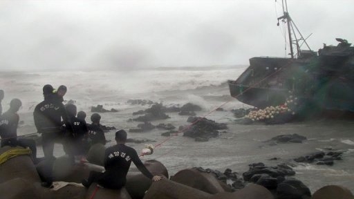 four dead 12 missing as typhoon pounds s korea