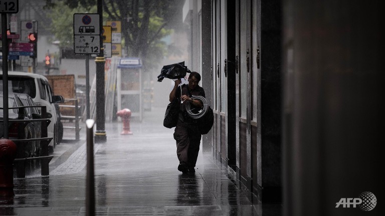 typhoon utor brings gales to hong kong on way to china