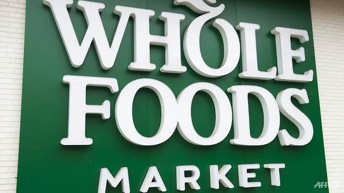 amazon says whole foods deal to close monday vows lower prices
