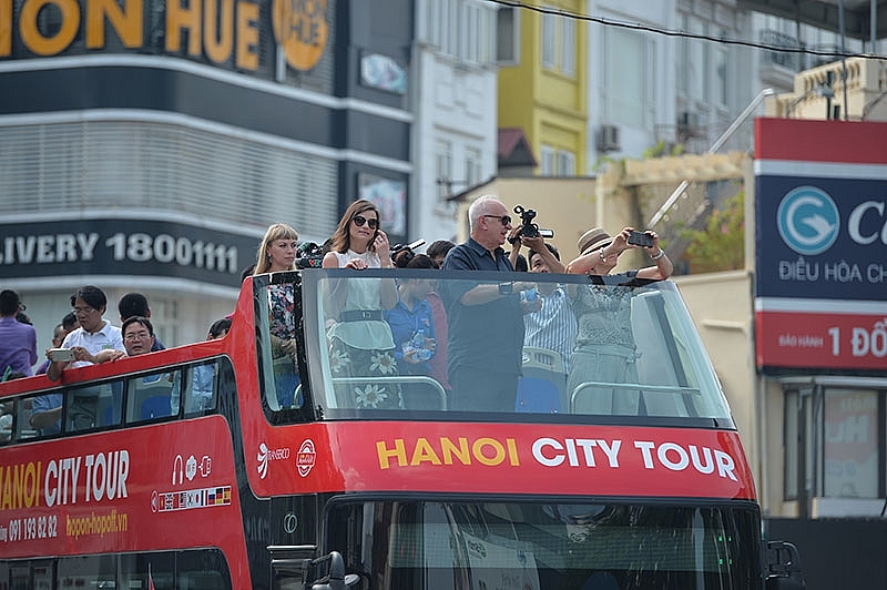 double decker bus tours a new face for hanoi tourism