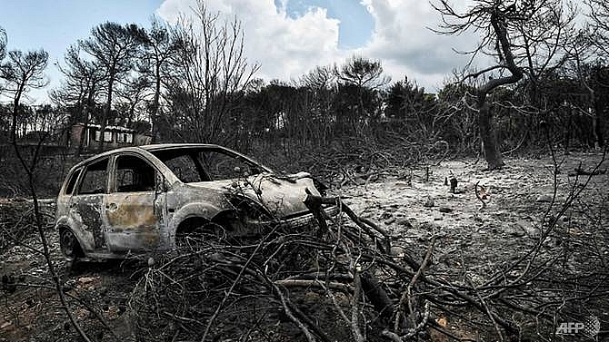 greek fire death toll rises to 91 officials