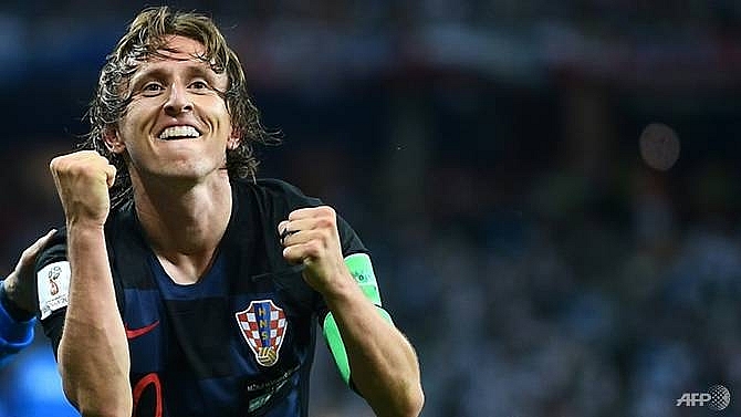 modric returns to real madrid training amid doubts over future