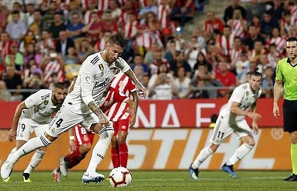 Bale and Benzema in the goals as Real Madrid survive scare