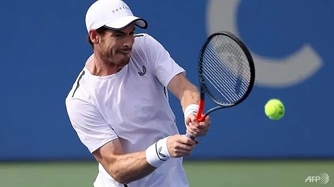 andy murray reunites with brother jamie for doubles win