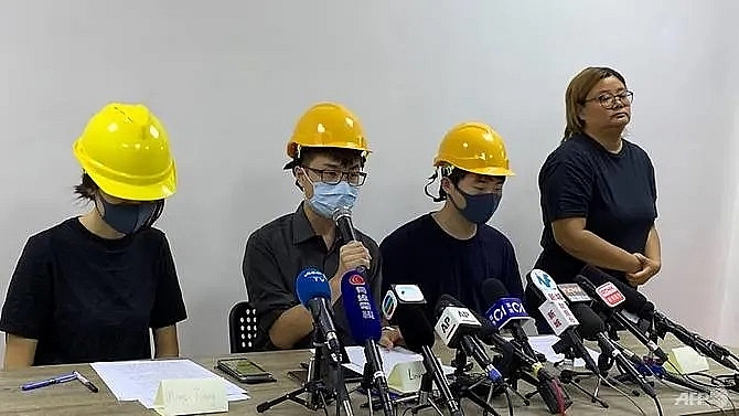masked hong kong protesters hold rare press conference
