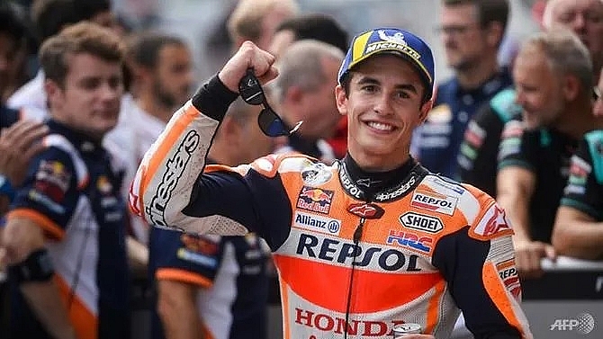 marquez claims landmark motogp pole in style with record lap