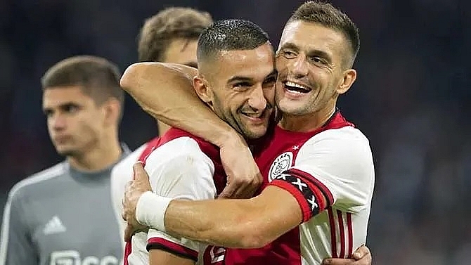 ajax see off paok to reach champions league playoffs