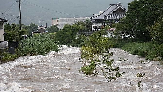 two dead as japan orders 670000 to flee heavy rains