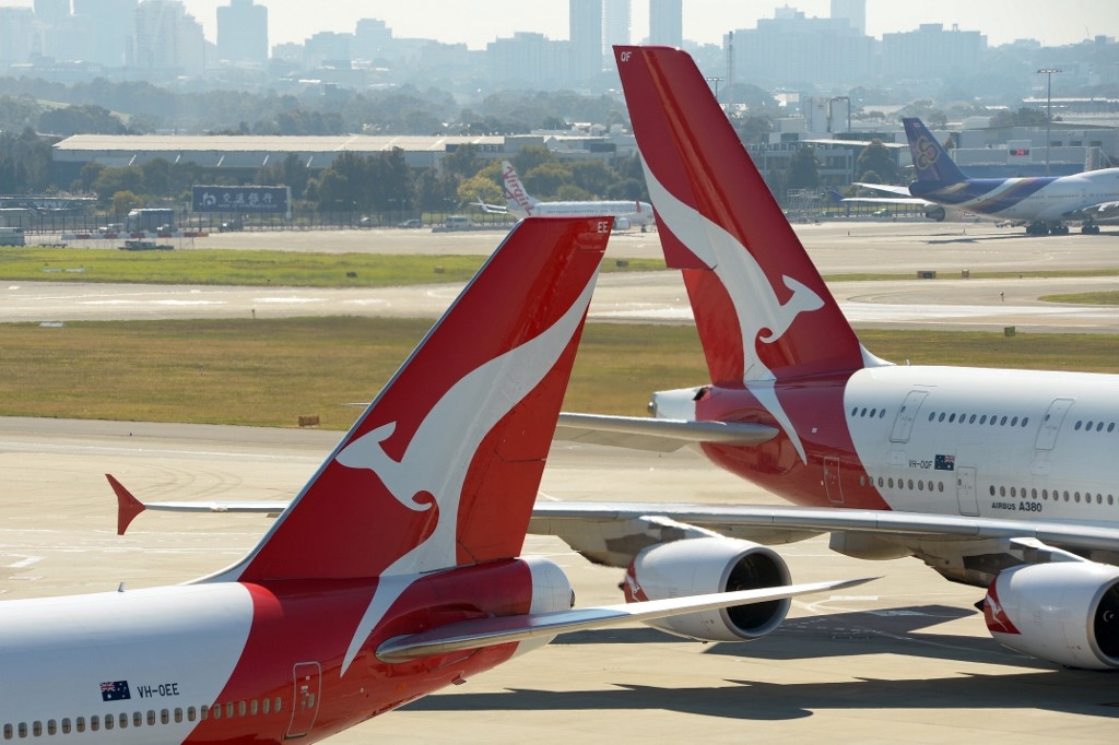 australias qantas posts us 19 bn loss confirms job cuts