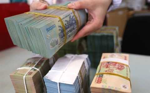 The average overnight interest rate in the trading session ending last week was 0.92 per cent per year, against 1.21 per cent in May. - Photo cafef.vn