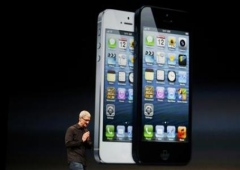 Apple Inc. CEO Tim Cook takes the stage after the introduction of the iPhone 5 during Apple Inc.