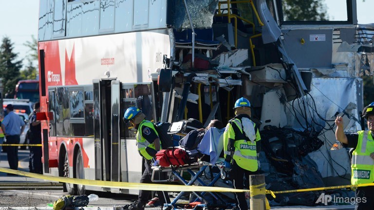 at least 5 dead in canada bus train crash