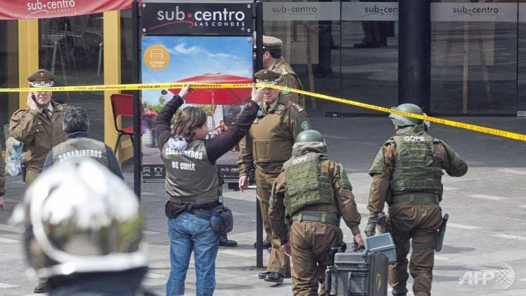 bomb rocks chile metro seven injured