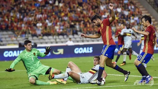 silva double gives spain win over belgium