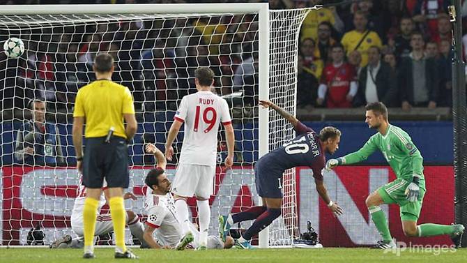 neymar leads psg past bayern batshuayi stuns atletico