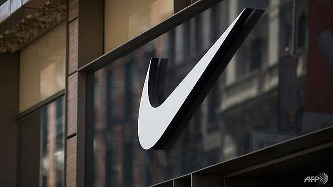 nike touts edgy ads but shares fall on mixed earnings