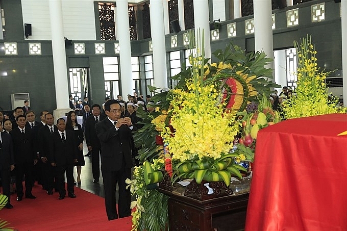 foreign friends pay tribute to late president tran dai quang