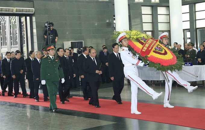 party state na govt leaders pay tribute to president quang