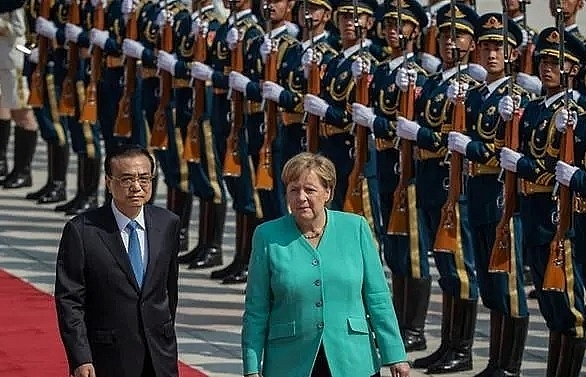 Merkel in Beijing says Hong Kong freedoms must be 'guaranteed'