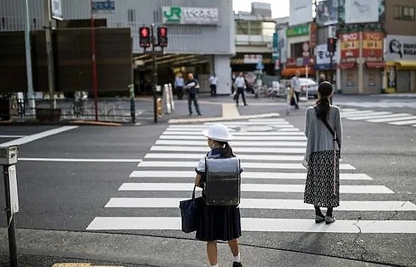 japan raids stores over school uniform cartel