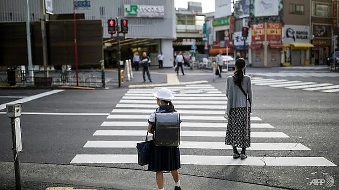 japan raids stores over school uniform cartel