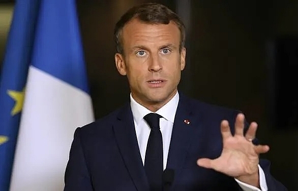 'France can't host everyone,' says Macron in new toughening of migration stance