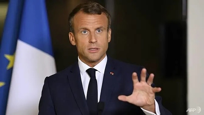 france cant host everyone says macron in new toughening of migration stance