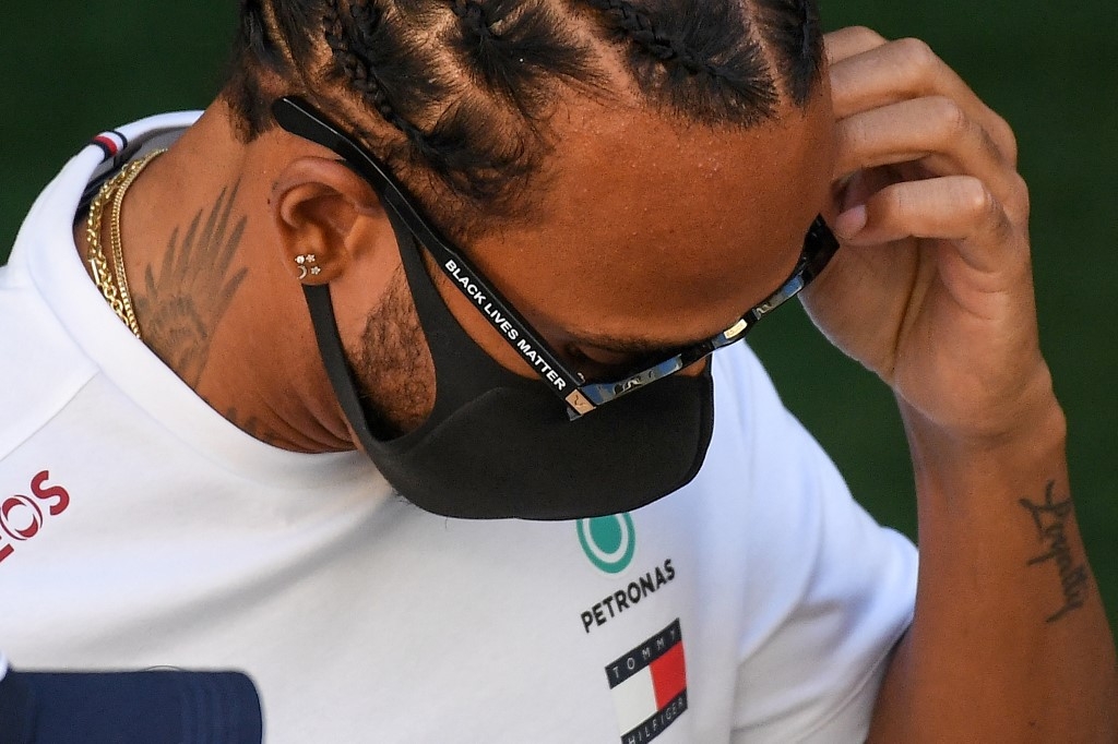 hamilton plays down significance of records makes f1 equality pledge