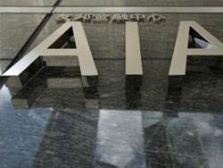 aia shares soar 12 per cent on trading debut