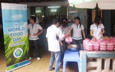 scb vietnam provided charitable meals for children on world food day 2011