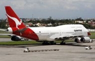 Qantas flight turns back as labour dispute grows
