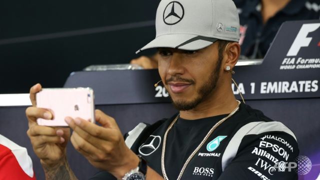 surly hamilton blames guy above for f1 engine woe