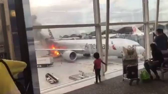 fire breaks out near passenger jet at hong kong airport 1 injured